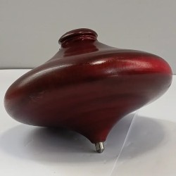 Malaysian plate spinning top