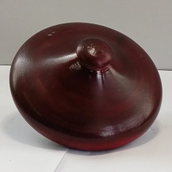 Malaysian plate spinning top