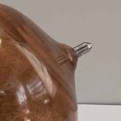 Malaysian heart spinning top