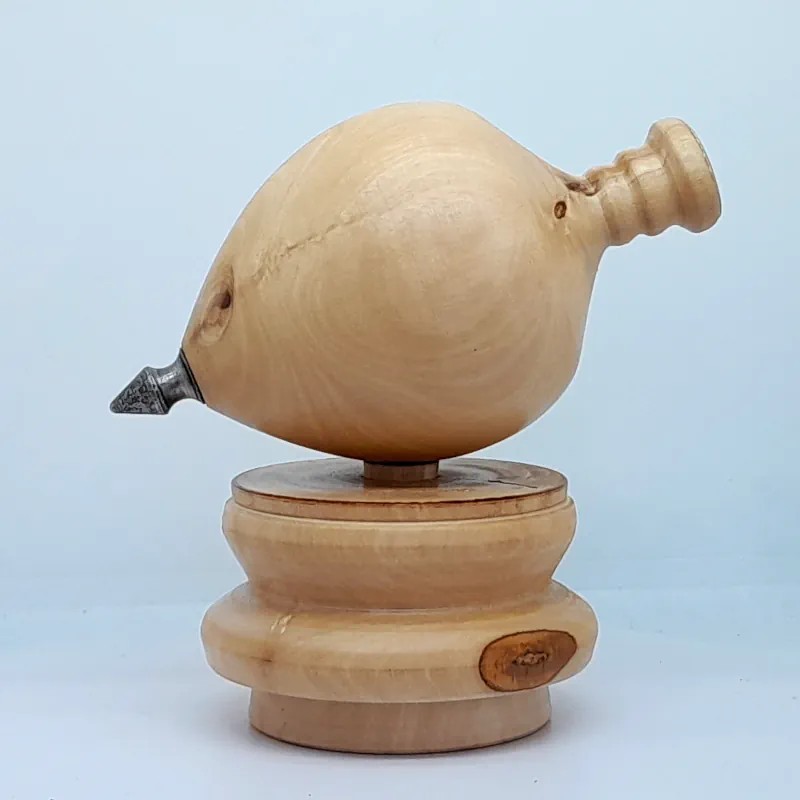 Olive wood spintop by Rocco